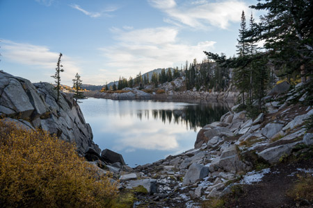 Mountain lake autumn snow
